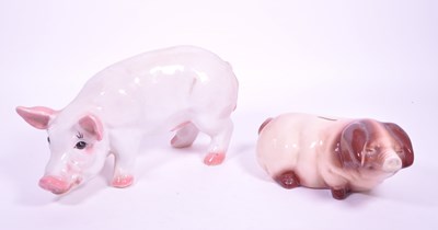 Lot 30 - TWO LATE 20TH CENTURY CERAMIC PIG FIGURES