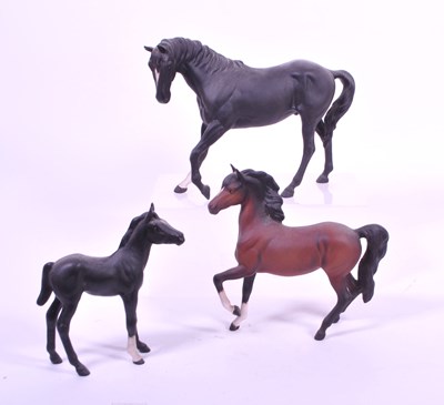 Lot 35 - BESWICK - THREE MID CENTURY BISQUE PORCELAIN HORSE FIGURES