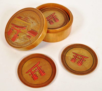 Lot 253 - JAPANESE 20TH CENTURY WOODEN CIRCULAR BOXED SET OF COASTERS