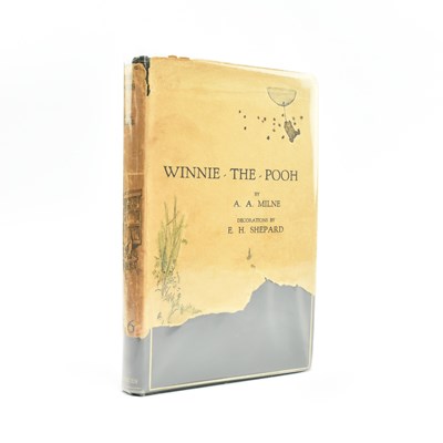 Lot 90 - MILNE, A. A. 1927 WINNIE THE POOH FIRST EDITION IN FIRST ISSUE DUST JACKET
