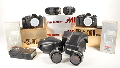 Lot 291 - NIKON - TWO 1980S F-301 CAMERA BODIES & LENSES