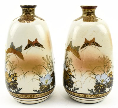 Lot 147 - PAIR OF JAPANESE MEIJI PERIOD KUTANI SAKE BOTTLE 日本明治九谷烧酒壶一对