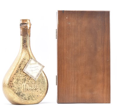 Lot 163 - HARRODS - ARMAGNAC AGE D'OR FROM GASCONY, FRANCE IN 21CT GILT BOTTLE