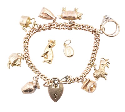 Lot 353 - HALLMARKED 9CT GOLD CHARM BRACELET AF & CHARMS
