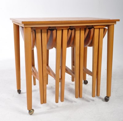 Lot 551 - POUL HUNDEVAD, DENMARK - MID CENTURY TEAK QUARTETTO NEST OF TABLES