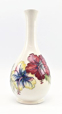 Lot 33 - MOORCROFT - PANSY - CERAMIC BALUSTER VASE IN CREAM WITH FLORAL DECORATION