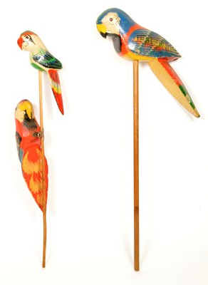 Lot 382 - TWO EARLY 20TH CENTURY VINTAGE WOODEN PARROTS MOUNTED ON STICKS