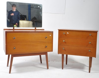 Lot 575 - BRITISH MODERN DESIGN - MID CENTURY TEAK CHEST OF DRAWERS & DRESSING CHEST