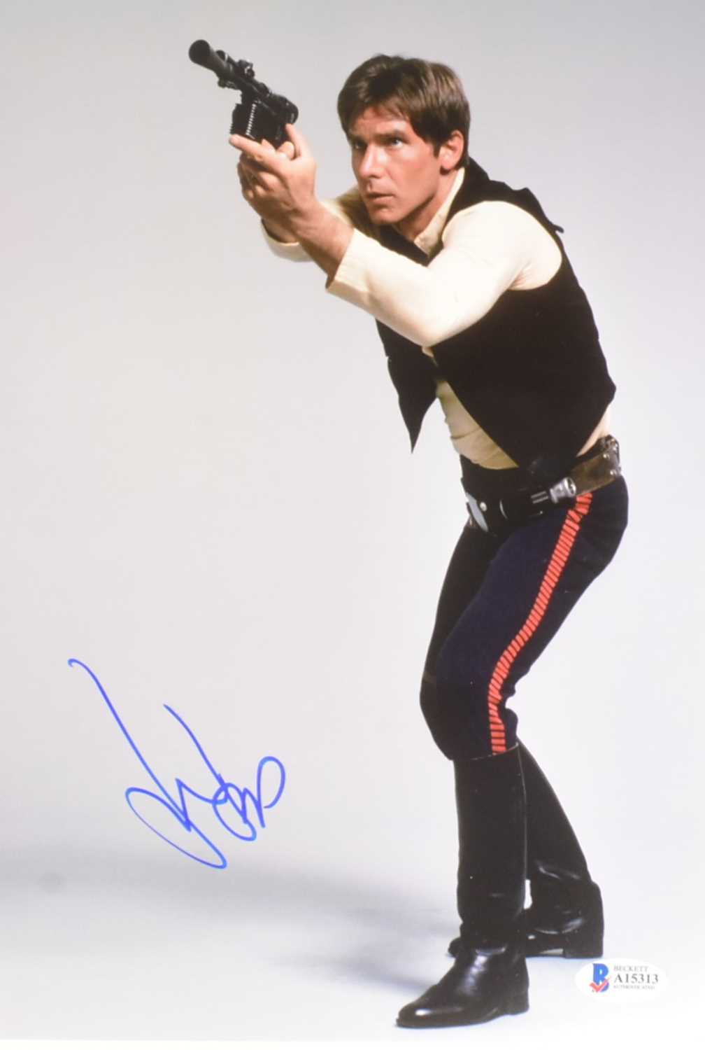 Lot 1 - STAR WARS - HARRISON FORD - AUTOGRAPHED 8X12" PHOTO - BECKETT AUTHENTICATED