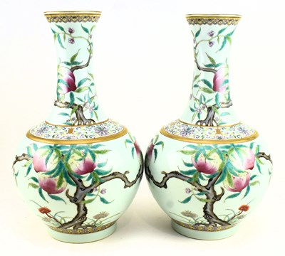 Lot 12 - PAIR OF LARGE “NINE PEACHES” TIANQIUPING VASES 宣统款 粉彩九桃图大天球瓶