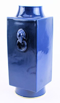 Lot 58 - LARGE GUANGXU MARK BLUE GLAZED CONG-SHAPED VASE 光绪款 祭蓝釉象耳琮式瓶