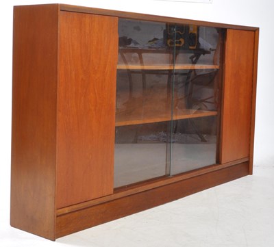 Lot 594 - HERBERT GIBBS - VINTAGE MID CENTURY TEAK BOOKCASE CABINET