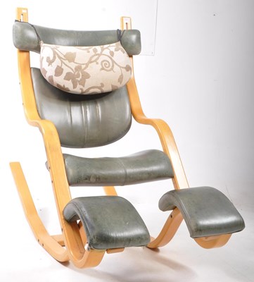 Lot 584 - STOKKE - PETER OPSVIK - MID CENTURY GRAVITY BALANCE ROCKING CHAIR