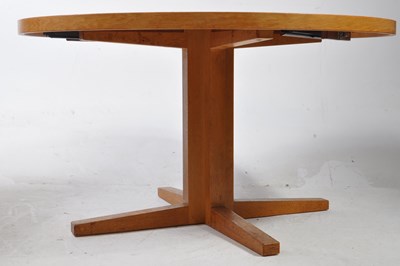 Lot 585 - DANISH MODERN DESIGN - HELTBORG MOBLER - EXTENDING OAK DINING TABLE