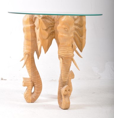 Lot 625 - LATE 20TH CENTURY CARVED WOODEN ELEPHANT SIDE TABLE