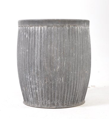 Lot 628 - A VINTAGE GALVANIZED STEEL BARREL PLANTER DOLLY