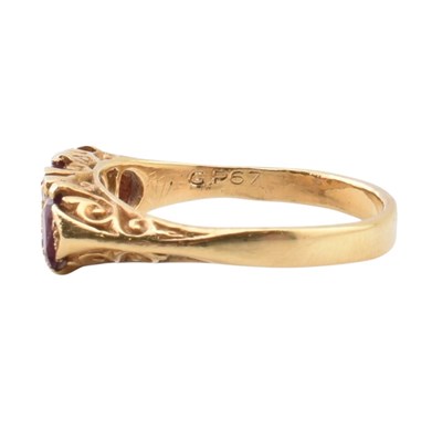 Lot 42 - 18CT GOLD RUBY & DIAMOND THREE STONE RING