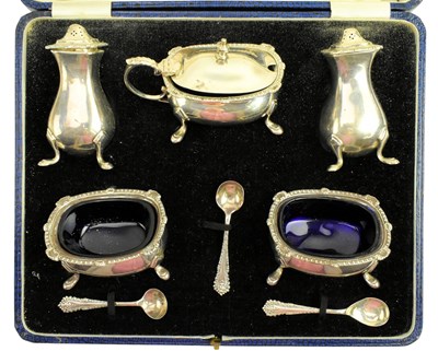 Lot 62 - CASED GEORGE V FIVE-PIECE HALLMARKED SILVER & GLASS LINED CRUET SET