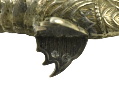 Lot 88 - A 20TH CENTURY SPANISH SILVER ARTICULATED FISH WITH EMERALD GLASS EYES