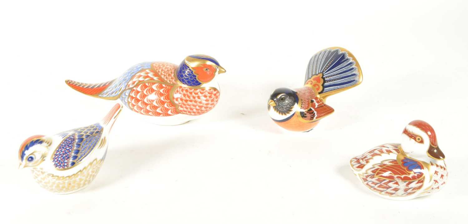Lot 27 - ROYAL CROWN DERBY - FOUR 21ST CENTURY BONE CHINA BIRD PAPERWEIGHTS