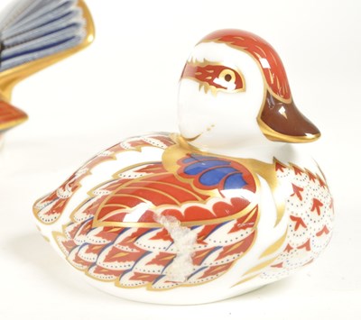 Lot 27 - ROYAL CROWN DERBY - FOUR 21ST CENTURY BONE CHINA BIRD PAPERWEIGHTS