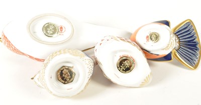 Lot 27 - ROYAL CROWN DERBY - FOUR 21ST CENTURY BONE CHINA BIRD PAPERWEIGHTS