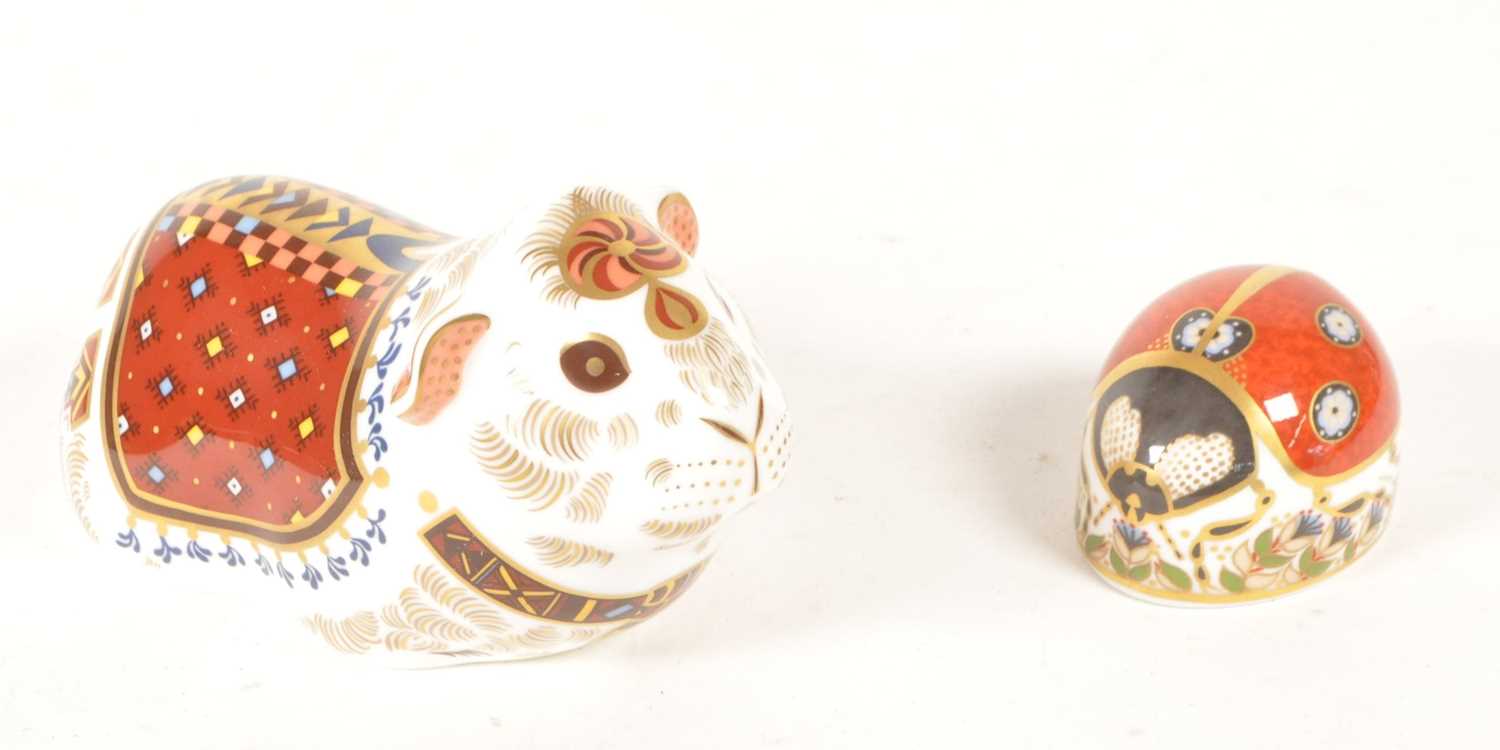 Lot 32 - ROYAL CROWN DERBY - TWO 21ST CENTURY BONE CHINA PAPERWEIGHT FIGURES