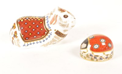 Lot 32 - ROYAL CROWN DERBY - TWO 21ST CENTURY BONE CHINA PAPERWEIGHT FIGURES