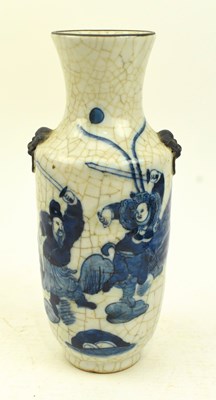 Lot 16 - QING CRACKLED GLAZED BLUE AND WHITE VASE 清 哥窑青花双耳瓶