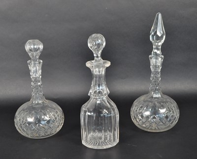 Lot 48 - THREE 20TH CENTURY CRYSTAL CUT GLASS DECANTERS WITH STOPPERS