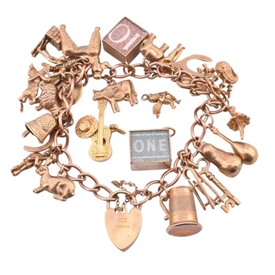 Lot 70 - HALLMARKED 9CT GOLD CHARM BRACELET & FOUR LOOSE CHARMS