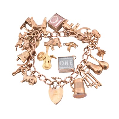 Lot 70 - HALLMARKED 9CT GOLD CHARM BRACELET & FOUR LOOSE CHARMS