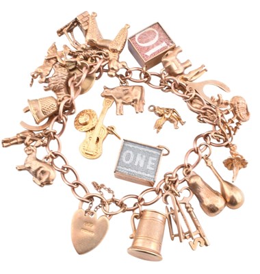 Lot 70 - HALLMARKED 9CT GOLD CHARM BRACELET & FOUR LOOSE CHARMS