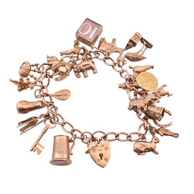 Lot 70 - HALLMARKED 9CT GOLD CHARM BRACELET & FOUR LOOSE CHARMS