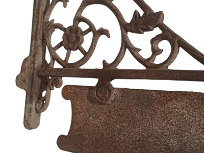 Lot 163 - EARLY 20TH CENTURY CAST IRON HANGING SHOP SIGN