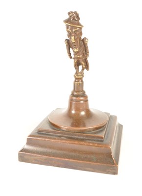 Lot 240 - BRASS 19TH CENTURY TOBACCO STOPPER WITH TIBETAN BRASS RITUAL BELL