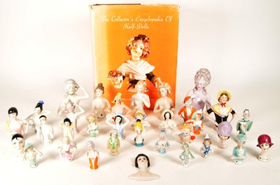 Lot 98 - COLLECTION OF 20TH CENTURY PORCELAIN PIN CUSHION HALF DOLLS AND BOOK