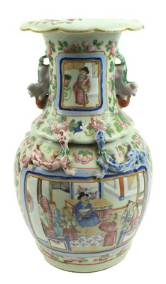 Lot 262 - QING DYNASTY FAMILLE ROSE LION HANDLED VASE 清 粉彩开光人物双耳瓶