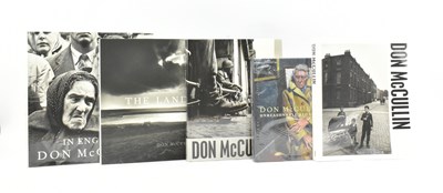 Lot 223 - PHOTOGRAPHY. COLLECTION OF FIVE FIRST EDITIONS SIGNED BY DON MCCULLIN