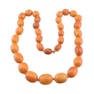 Lot 17 - EGG YOLK AMBER BEAD NECKLACE