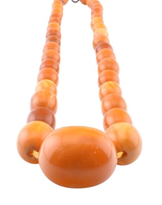 Lot 112 - EGG YOLK AMBER BEAD NECKLACE