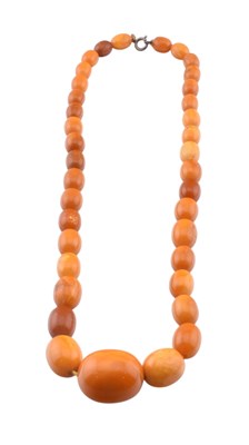 Lot 112 - EGG YOLK AMBER BEAD NECKLACE