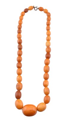 Lot 112 - EGG YOLK AMBER BEAD NECKLACE