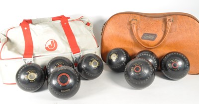 Lot 340 - THOMAS TAYLOR - TWO SETS OF VINTAGE LAWN BOWLS