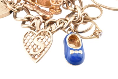Lot 75 - HALLMARKED 9CT GOLD CHARM BRACELET