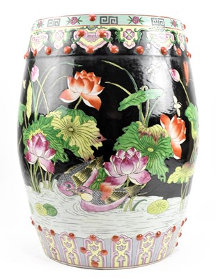 Lot 264 - 20TH CENTURY FAMILLE NOIRE 'LOTUS' STOOL 二十世纪黑底荷花纹鼓凳