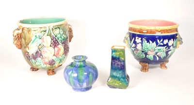 Lot 186 - TW0 LATE 19TH CENTURY MAJOLICA PLANTERS WITH 20TH CENTURY VASES