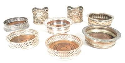 Lot 430 - COLLECTION OF VICTORIAN SILVER PLATE BOTTLE COASTERS