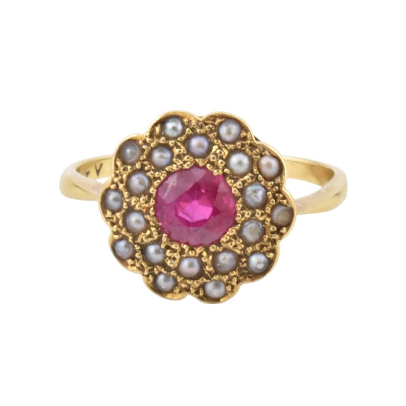 Lot 106 - A GOLD PEARL AND SYNTHETIC RUBY CLUSTER RING