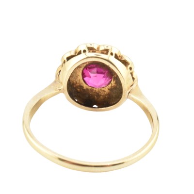 Lot 106 - A GOLD PEARL AND SYNTHETIC RUBY CLUSTER RING